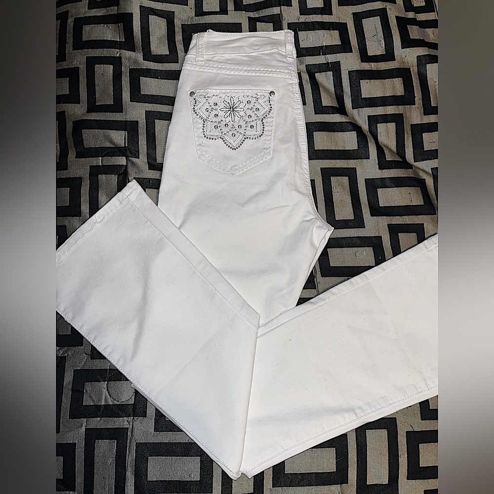 Brand new, Never been worn, white, size 7/8, designer jeans, rhinestone pockets
